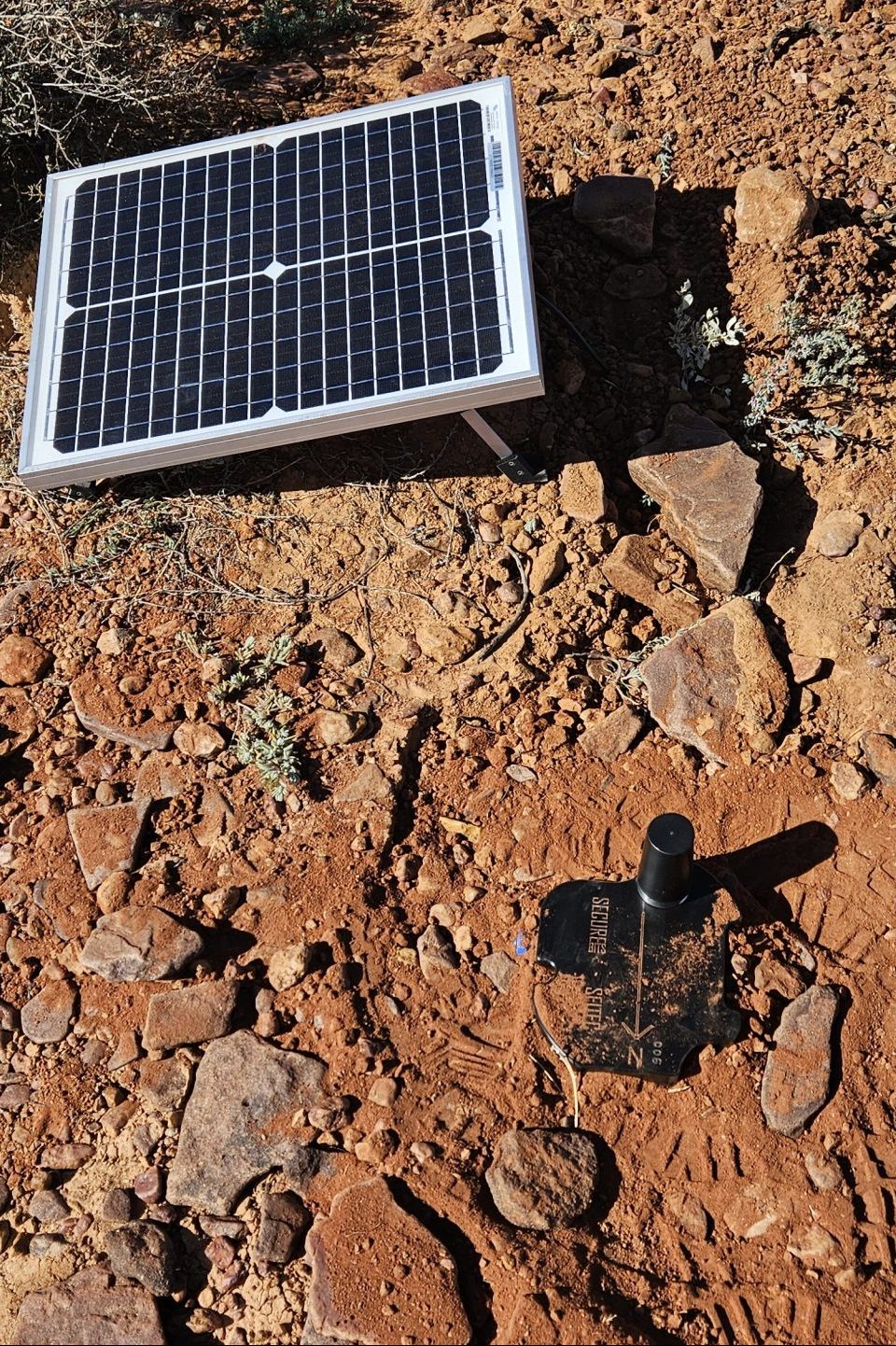 The UXOTrackS prototype and solar panel installed at WTR.
